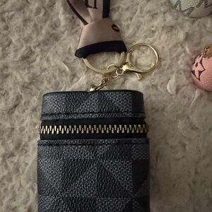 Stylish Women's BLACK Mini Bag-sold separately.